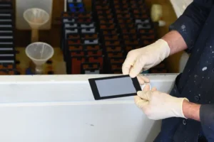 Lab worker holding sample